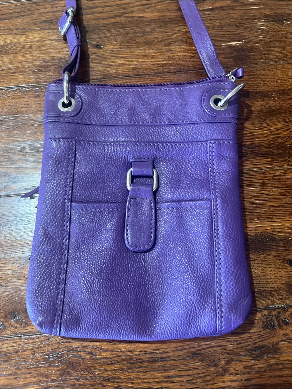 Sleek Purple Leather Crossbody with Front Pocket and Strap